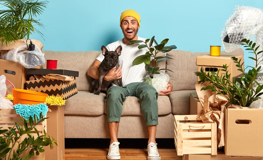 Man moving house with all packed boxes